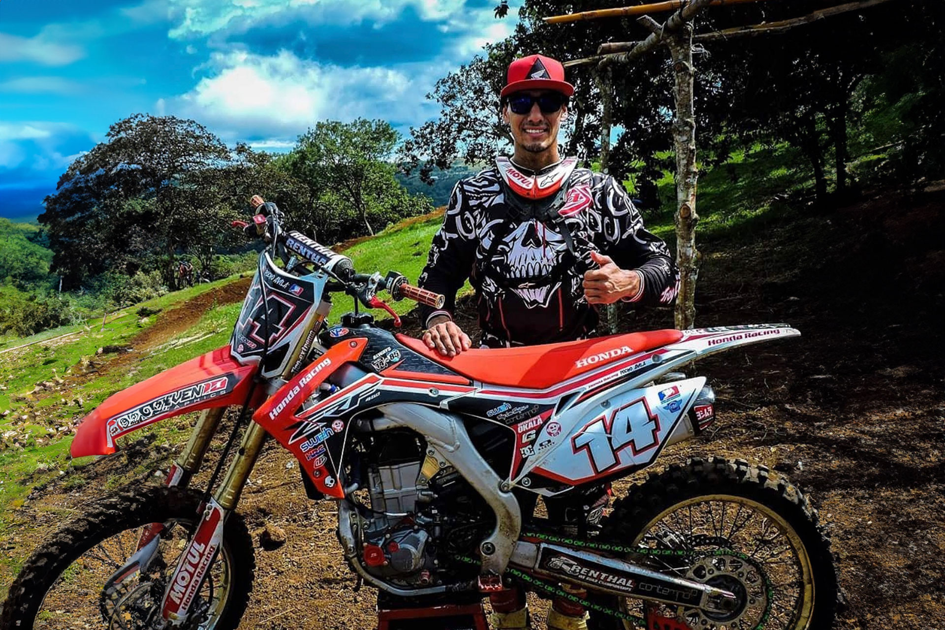 Pocho Avila in front of his bike